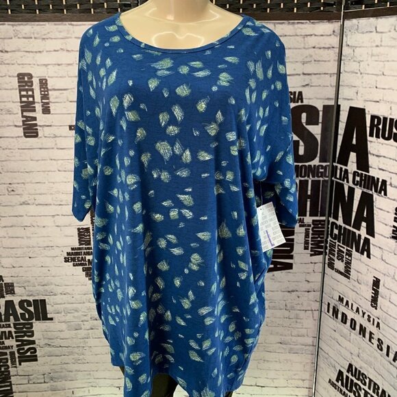 LuLaRoe Tops - LulaRoe Blue Print Crew Step Hem Irma Tunic Top